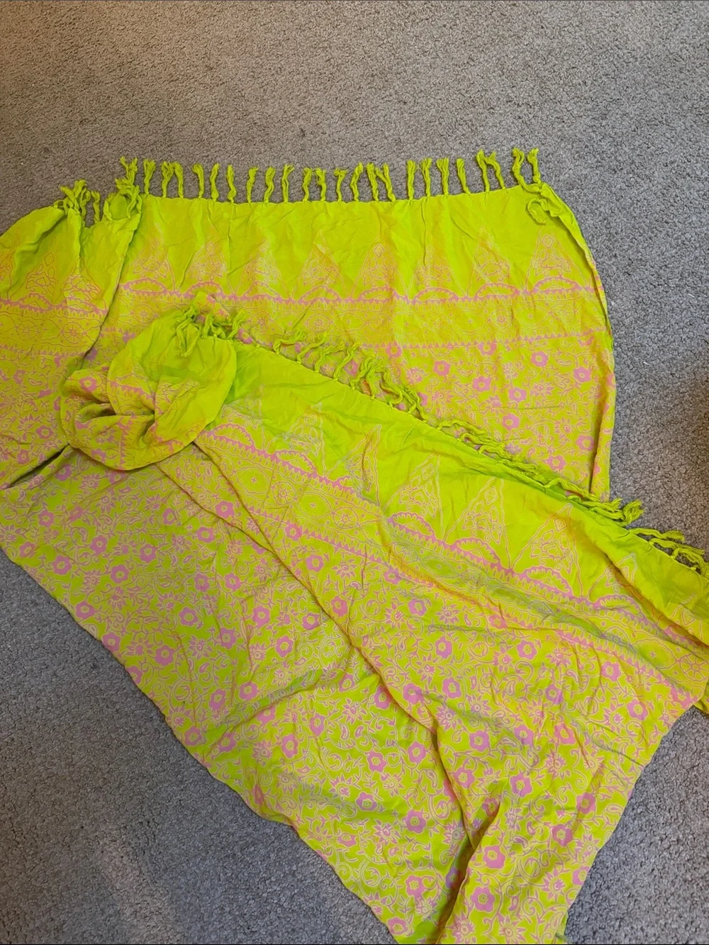 World market Sarong in pink and light chartreuse  with long tassels at ends